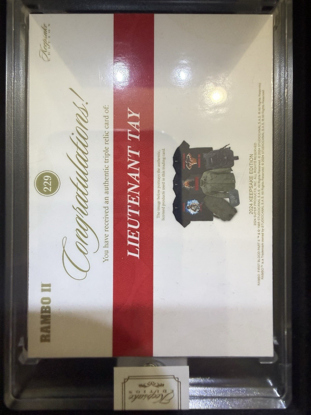 RAMBO Lieutenant TAY Keepsake Triple Relic /50. Error Card Lists Mitch Rogers