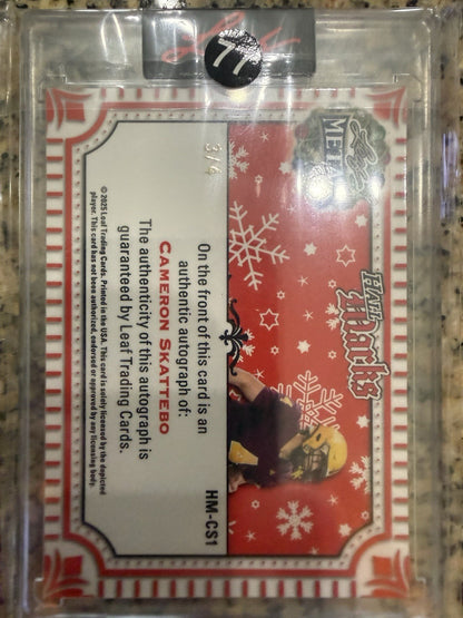 🏈 2025 leaf Metal holiday #D 3/4 Cam Skattebo Auto Giants Hall Marks Greetings